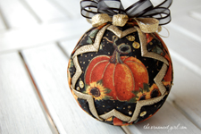 black and gold pumpkin quilted ornament